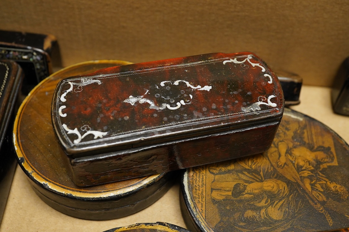 A collection of various snuff boxes to include papier mache examples, two with printed lids and some inlaid examples